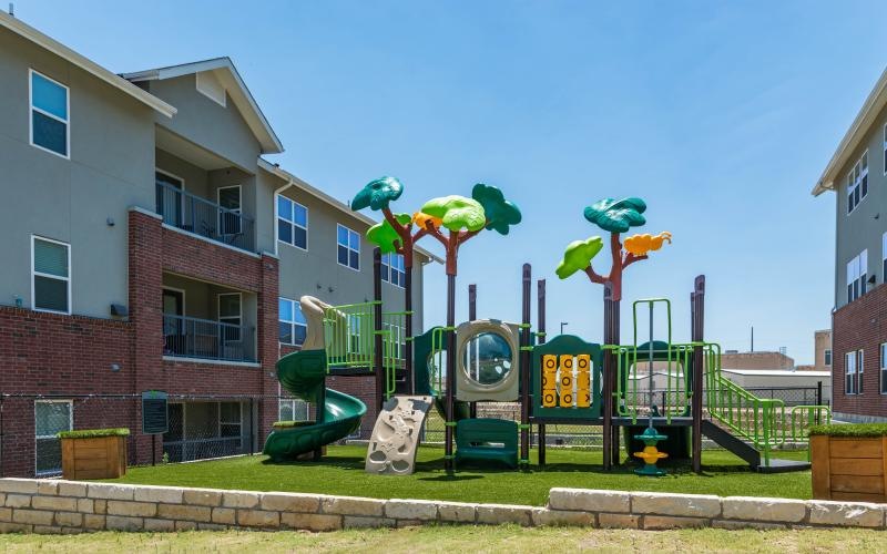 a playground in front of a building