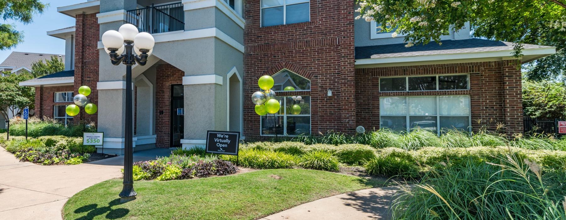 a building with a lamp post in front