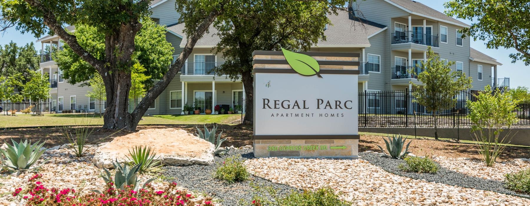 a sign in front of a building